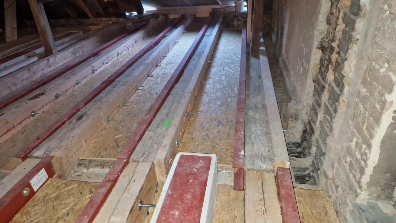 Reinforced joists right up to the masonry wall