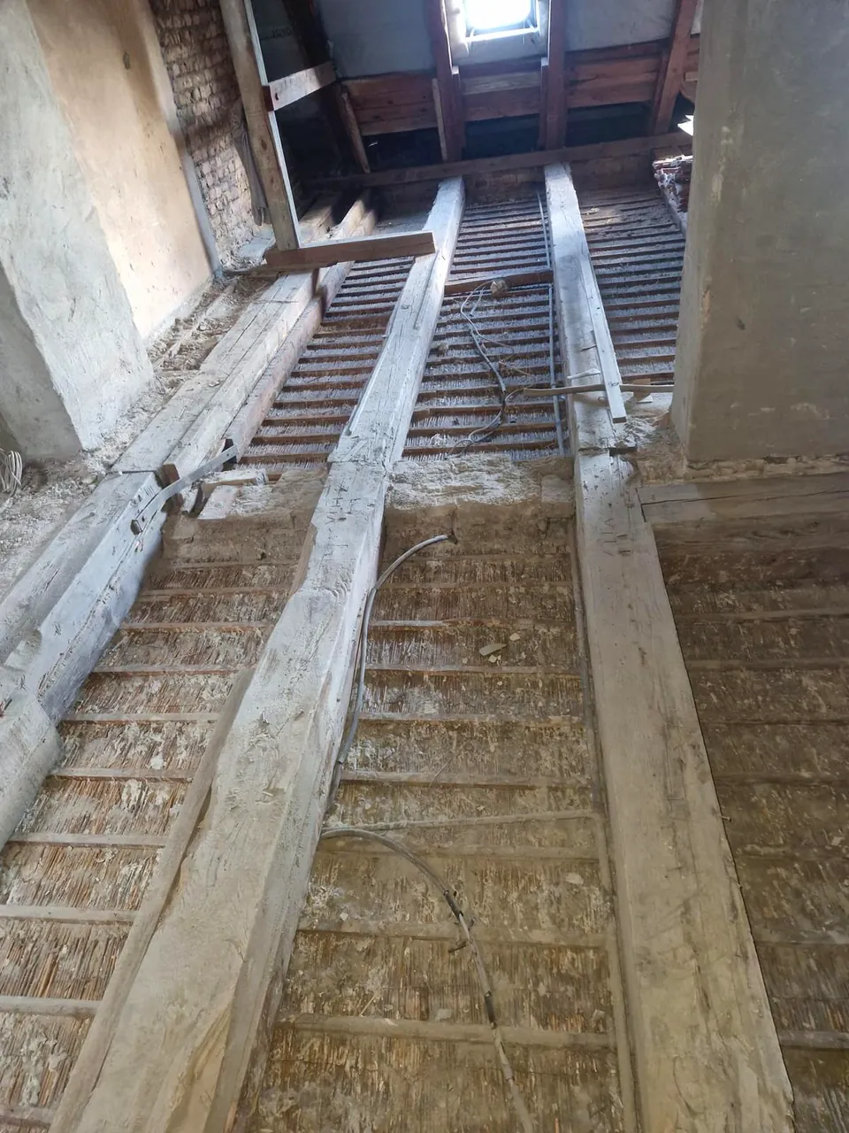 New joists alongside the old floor structure